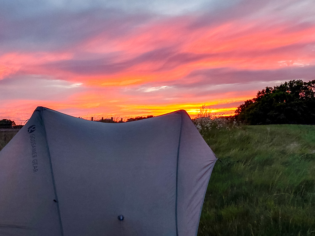 <center>2505-0032 - Tent and sunset -  May 27, 2025  <br>  (1/60 sec at f / 1.8 ISO 50    4 mm) </center>