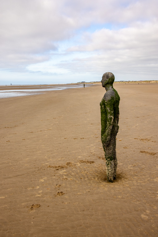 <center>2510-0105 - Another Place by Antony Gormley - Sculpture on Crosby Beach -  October 13, 2025  <br>  (1/160 sec at f / 18 ISO 400    38 mm) </center>